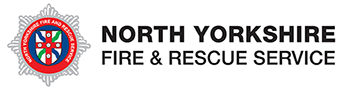 A shield sits on top of a silver star. There are words to the right which say North Yorkshire Fire and Rescue Service 